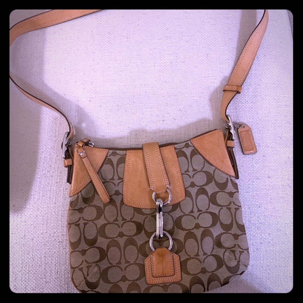 Coach crossbody or shoulder bag.